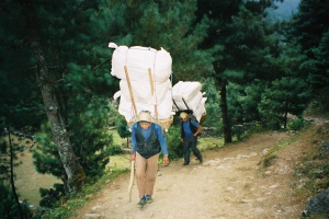 Porters carrying big loads near Phakding