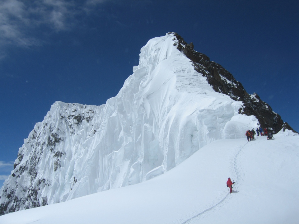 The true summit of Broad Peak is on the left