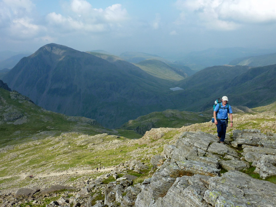 Brian with Great Gable and Sty Head Tarn in the distance