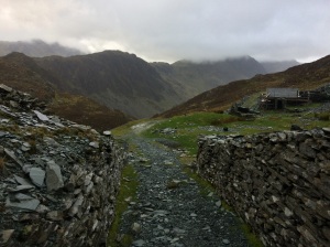 Dubs Bothy near Honister currently getting some repairs done, Haystacks is on the left.