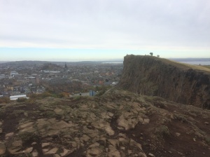 Salisbury Crags with Edinburgh Castle in the distance